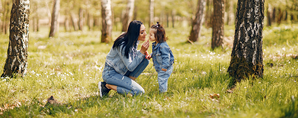 Cute and stylish family in a spring park